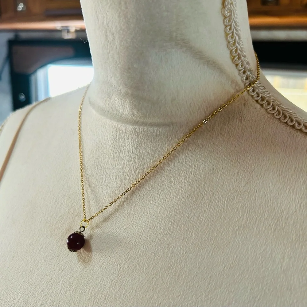 Handcrafted vintage bead capped burgundy glass pendant on chain necklace